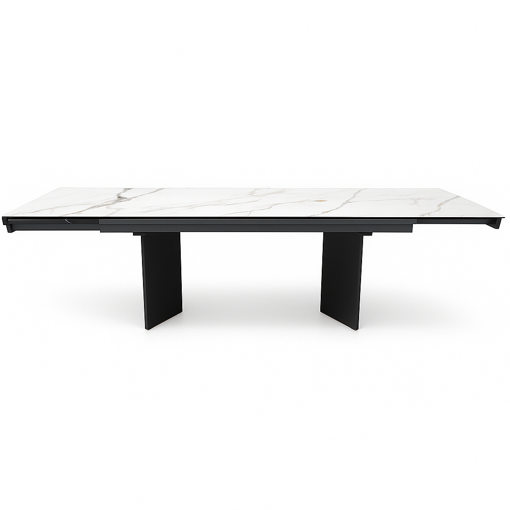 Mesa de comedor Calia extensible 180–296 cm con tablero cerámico y patas gris azulado. Diseño moderno, alta resistencia y gran capacidad para salones y comedores.