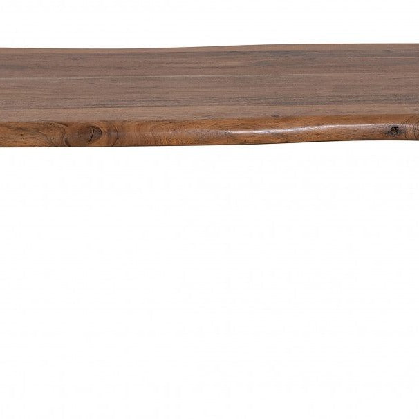 Mesa de centro VILNA de acacia con efecto óxido y patas en U negras. Un diseño industrial perfecto para salas modernas y con personalidad.